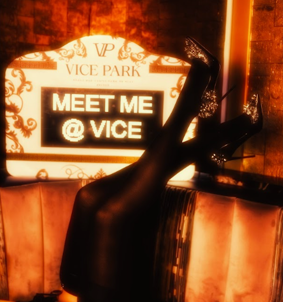 Warm-lit Vice Park 'Meet Me @ Vice' sign glowing above a velvet banquette